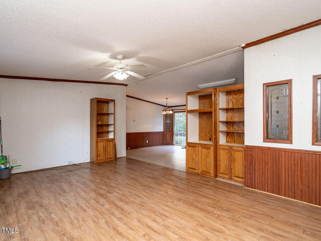 9140 Ransdell Road Raleigh, NC 27603 - Photo 5 of 26 wooden floor in an empty room with a window