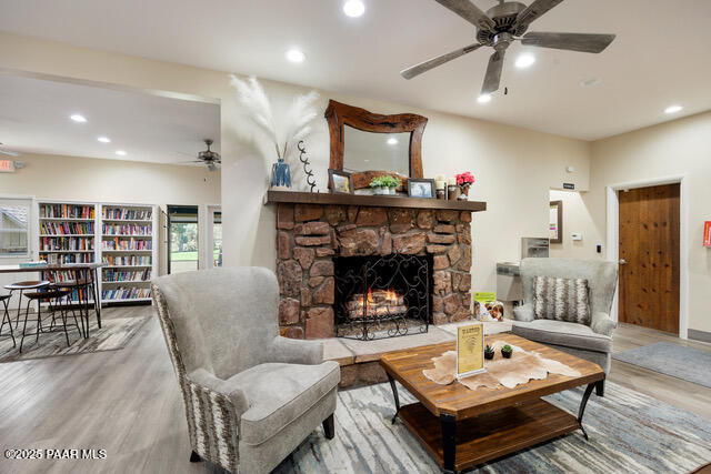 4600 Prairie Trail Prescott, AZ 86301 - Photo 16 of 19 a living room with furniture and a fireplace