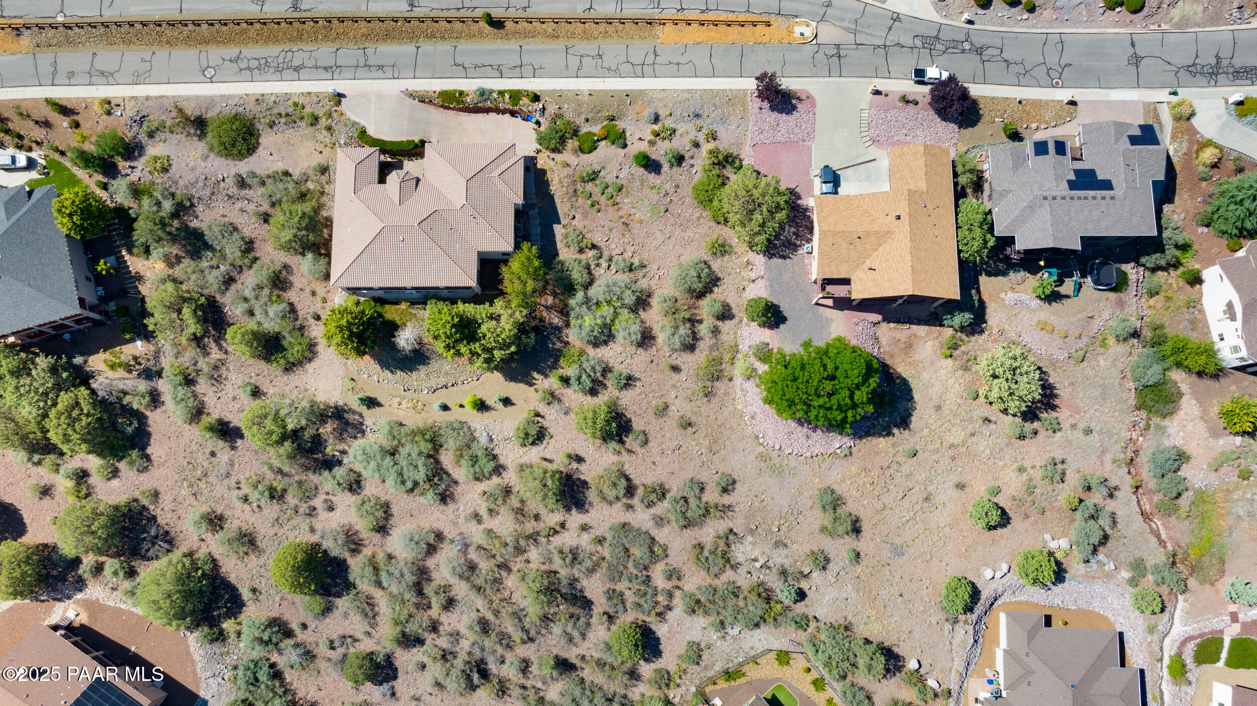 4600 Prairie Trail Prescott, AZ 86301 - Photo 4 of 19 an aerial view of a house with a yard and garden