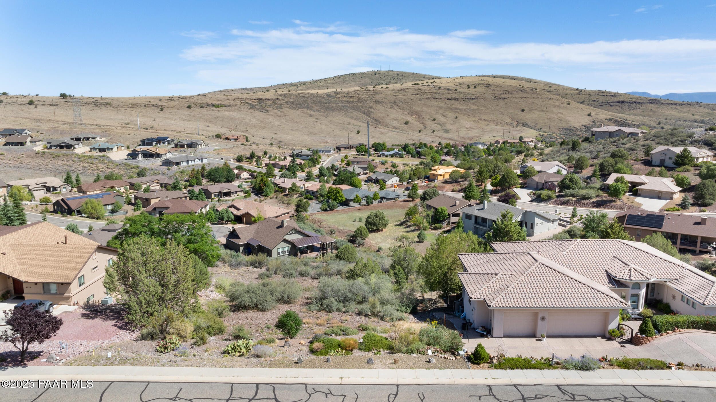4600 Prairie Trail Prescott, AZ 86301 - Photo 6 of 19 an aerial view of residential houses with outdoor space and trees