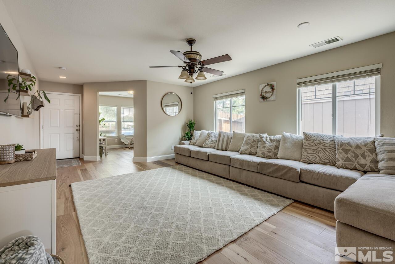 8950 Yeager Street Reno, NV 89506 - Photo 7 of 40 a living room with furniture and a large window