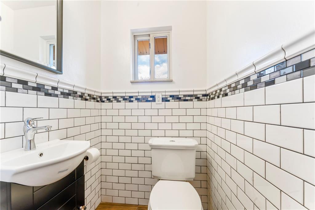 107 Robinson Church Road Bulger, PA 15019 - Photo 11 of 30 a bathroom with a toilet a sink and mirror