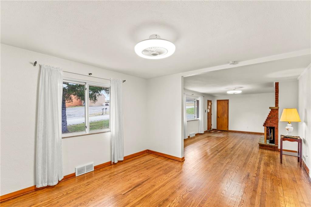 107 Robinson Church Road Bulger, PA 15019 - Photo 18 of 30 a view of a room with wooden floor and a window