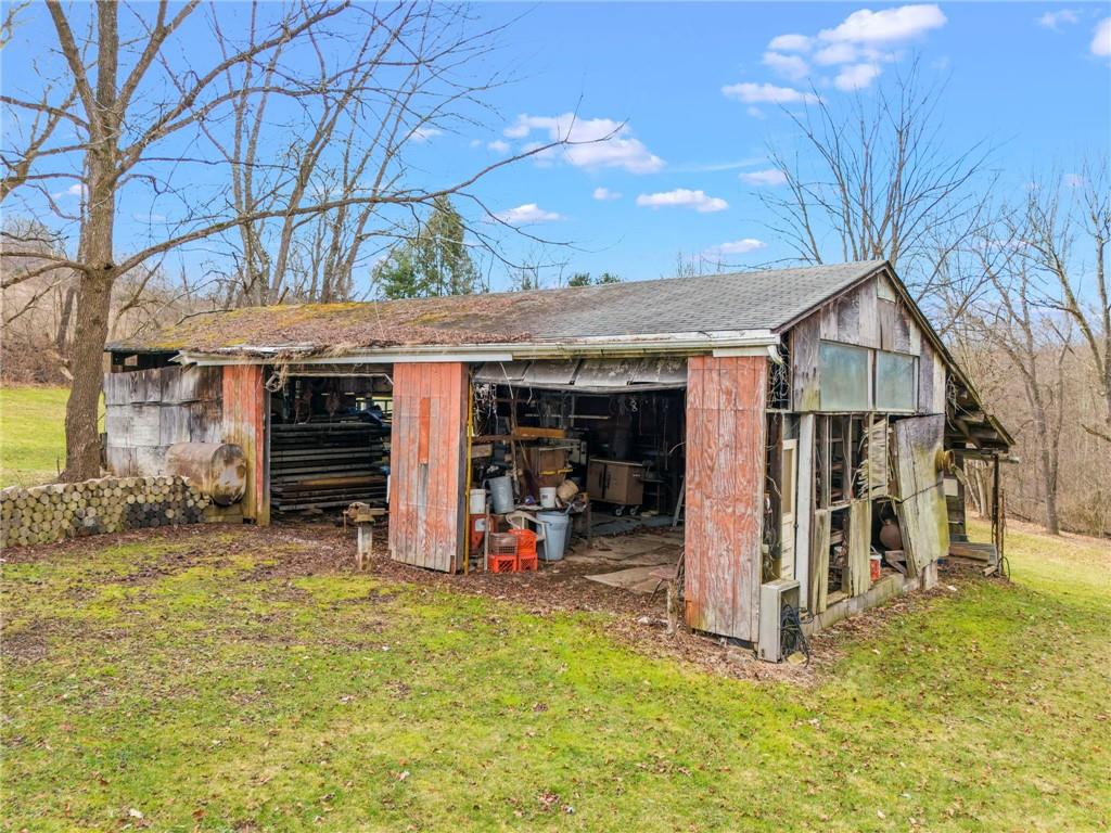 107 Robinson Church Road Bulger, PA 15019 - Photo 23 of 30 a view of a house with a yard patio and fire pit