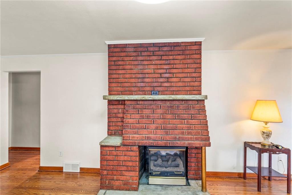 107 Robinson Church Road Bulger, PA 15019 - Photo 5 of 30 a view of fireplace and wooden floor