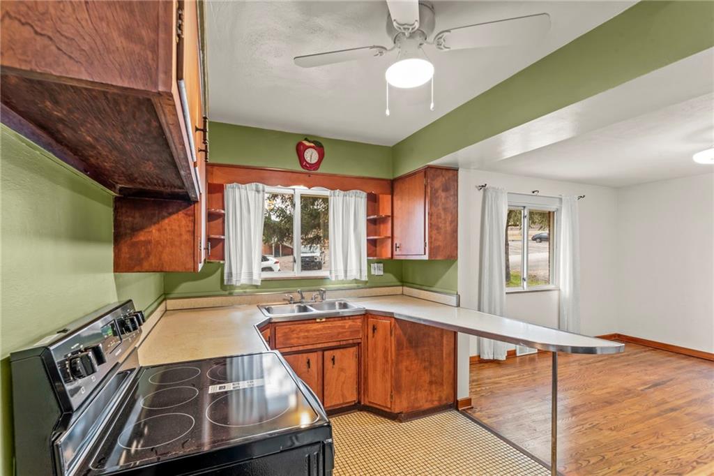 107 Robinson Church Road Bulger, PA 15019 - Photo 8 of 30 a kitchen with stainless steel appliances granite countertop a sink and a stove