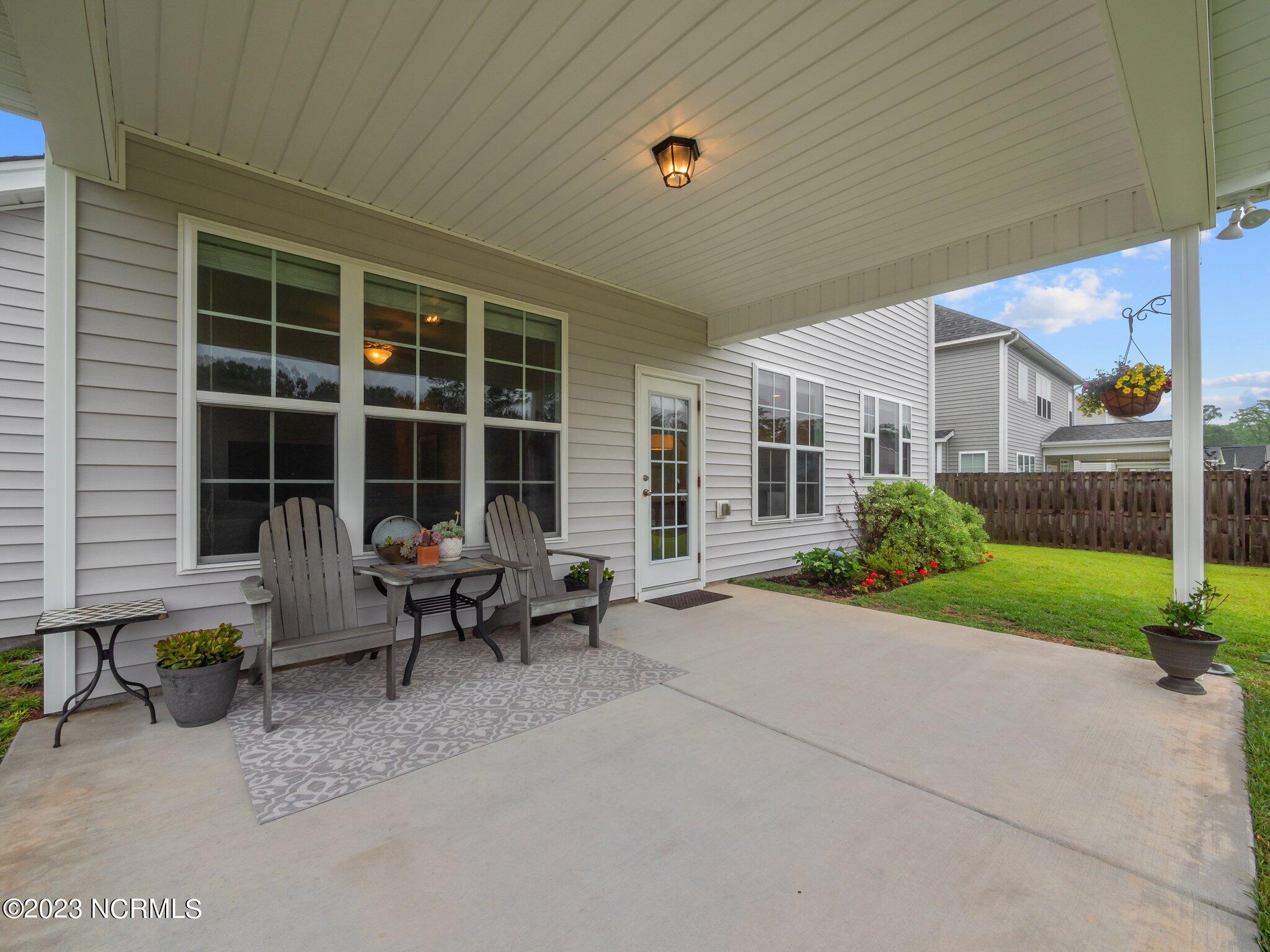 142 Poplar Branch Way Hampstead, NC 28443 - Photo 17 of 58 Back Patio