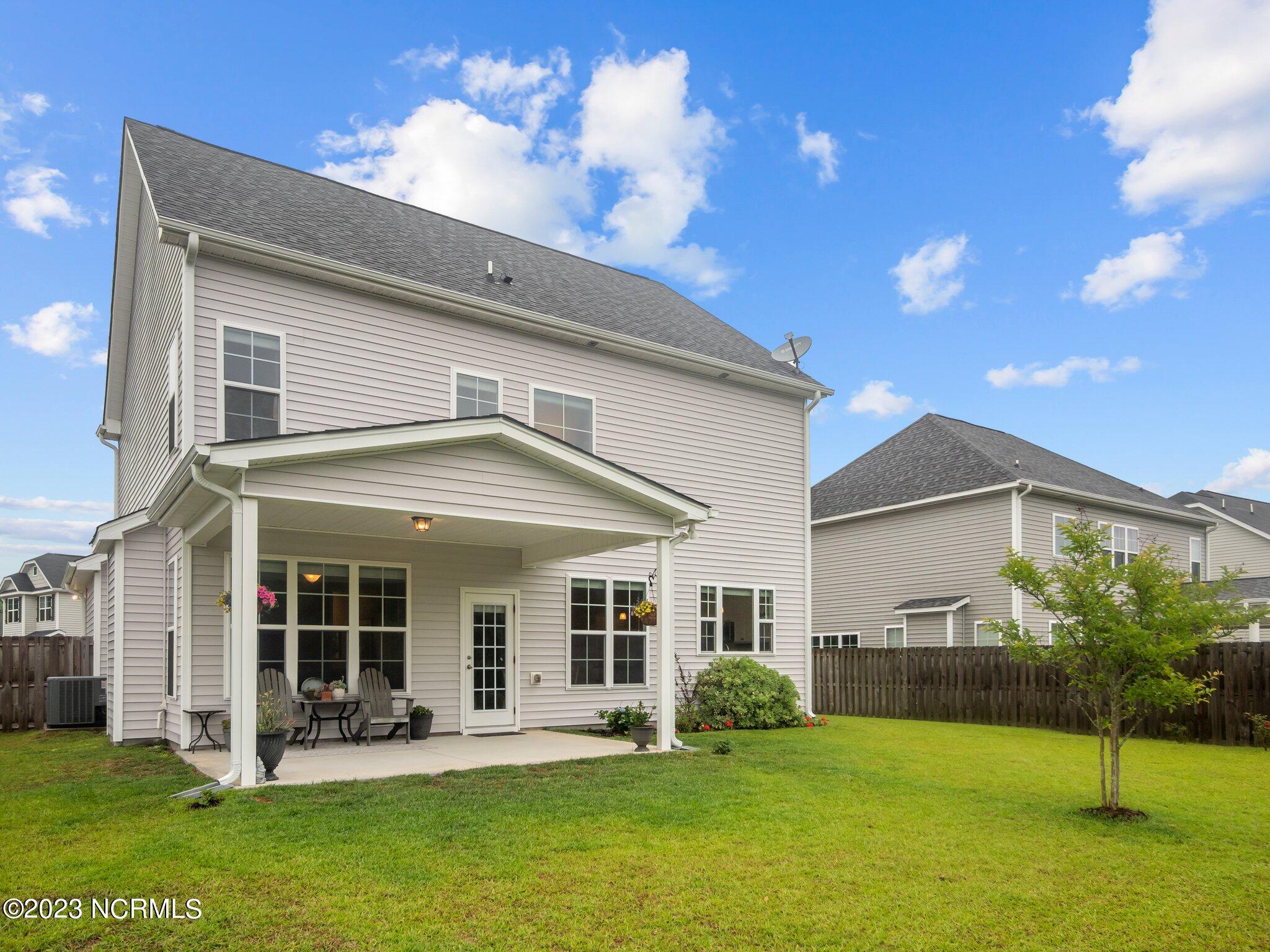 142 Poplar Branch Way Hampstead, NC 28443 - Photo 20 of 58 Back Patio