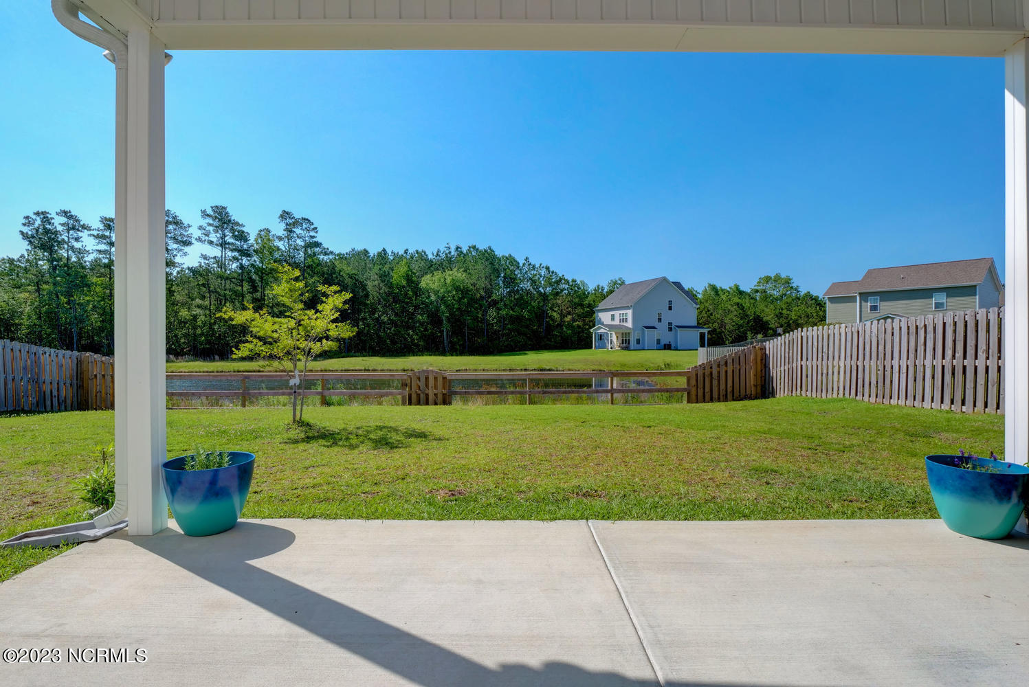 142 Poplar Branch Way Hampstead, NC 28443 - Photo 22 of 58 Back Patio View