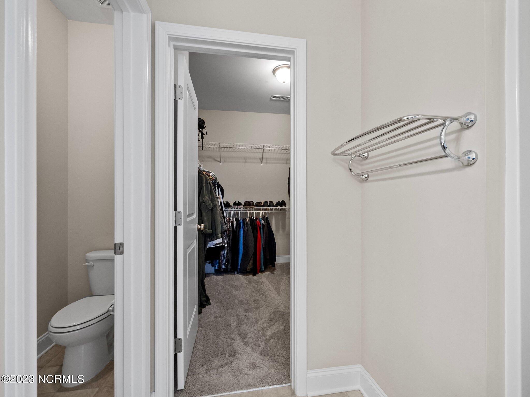 142 Poplar Branch Way Hampstead, NC 28443 - Photo 29 of 58 Master Bathroom and Walk-In Closet
