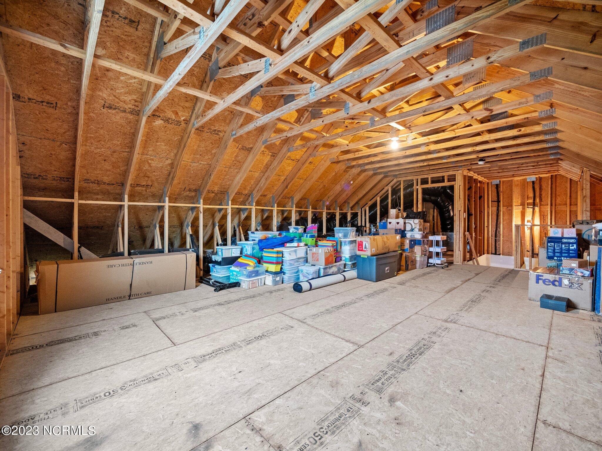 142 Poplar Branch Way Hampstead, NC 28443 - Photo 42 of 58 Unfinished Attic Space