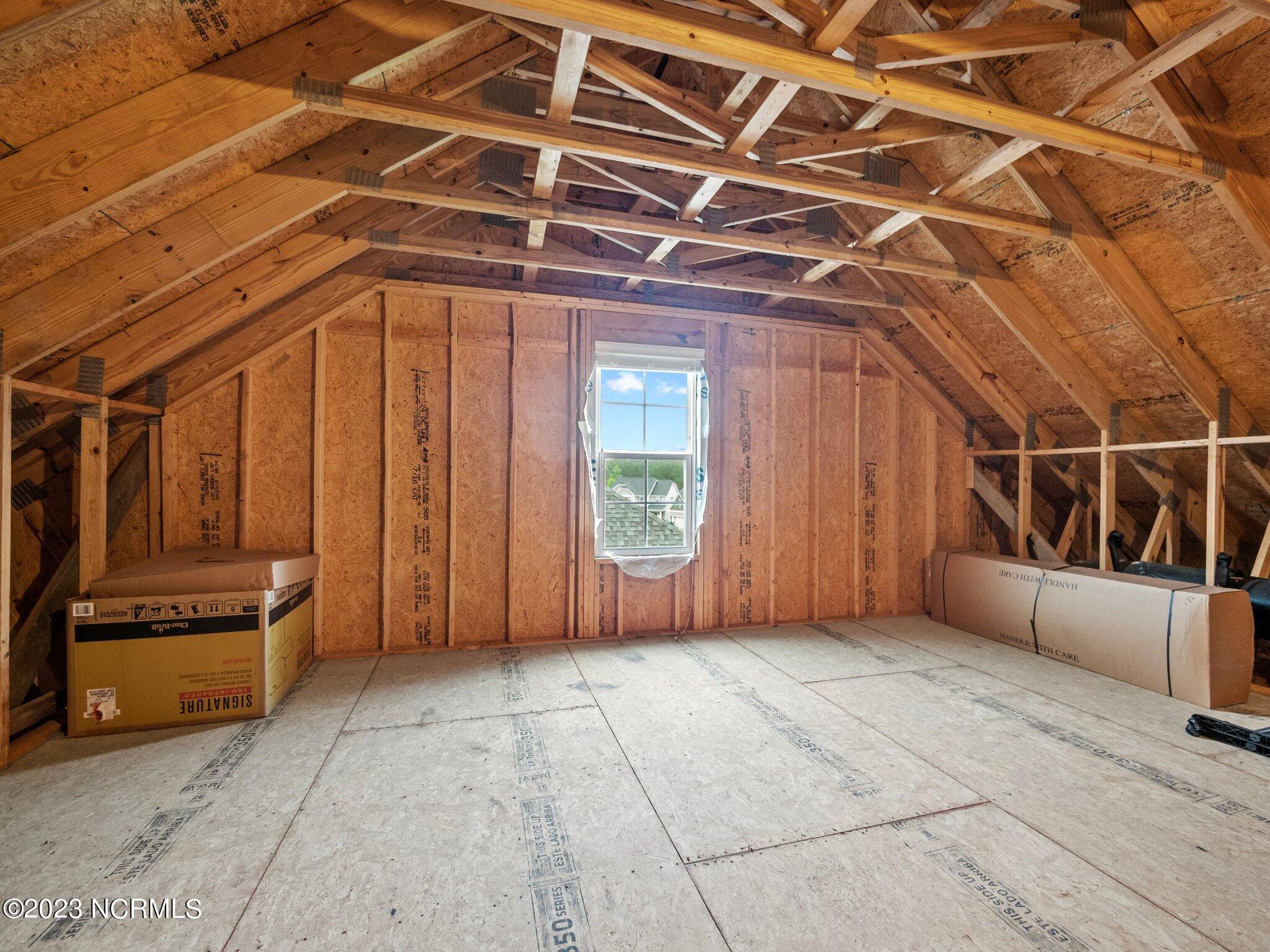 142 Poplar Branch Way Hampstead, NC 28443 - Photo 43 of 58 Unfinished Attic Space