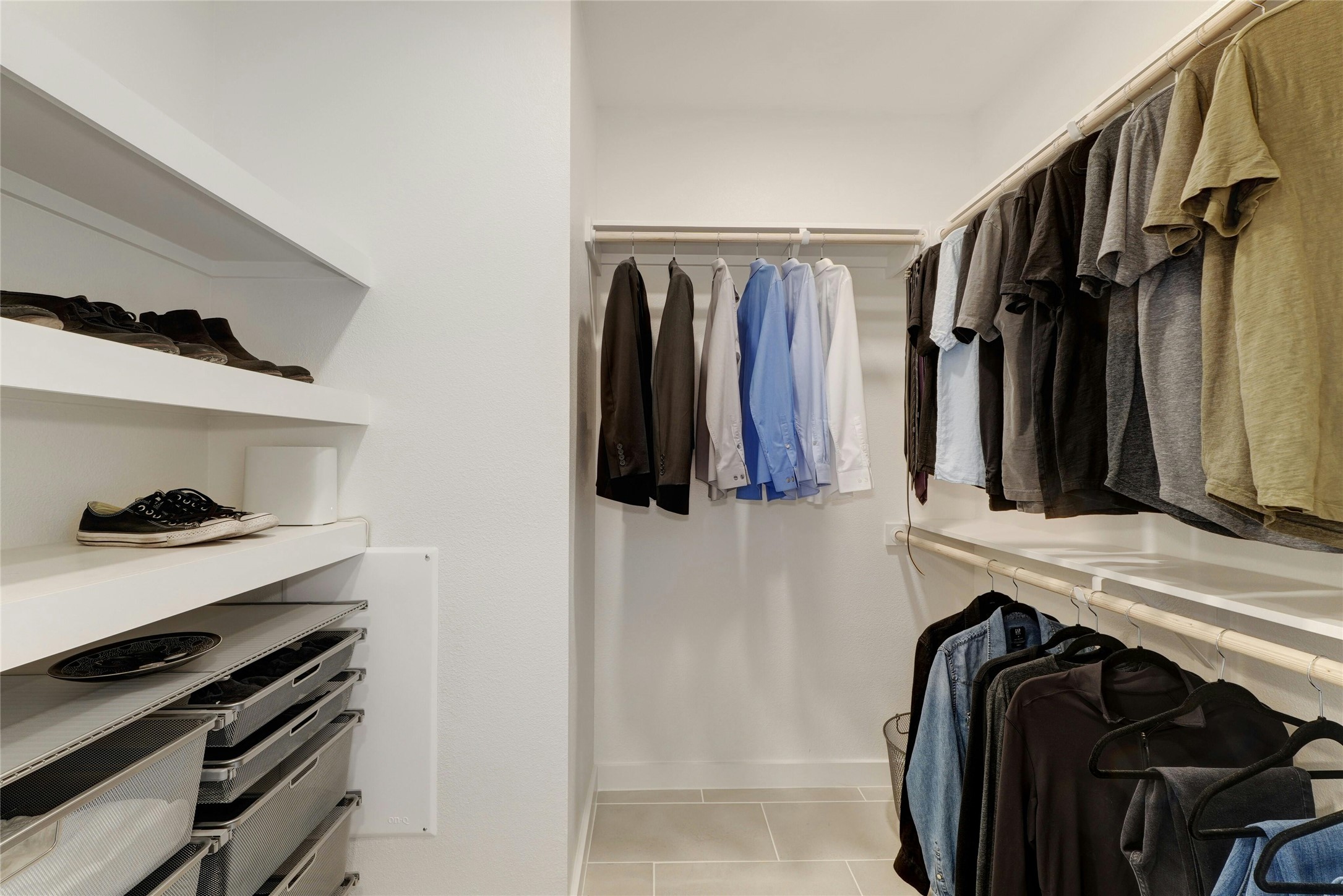 1600 South 1st Street, Unit 403 Austin, TX 78704 - Photo 18 of 33 a view of walk in closet with clothes and shoes