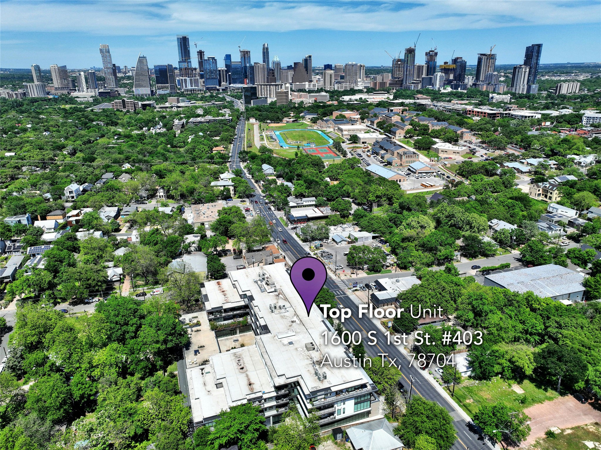 1600 South 1st Street, Unit 403 Austin, TX 78704 - Photo 32 of 33 an aerial view of residential house with outdoor space and lake view