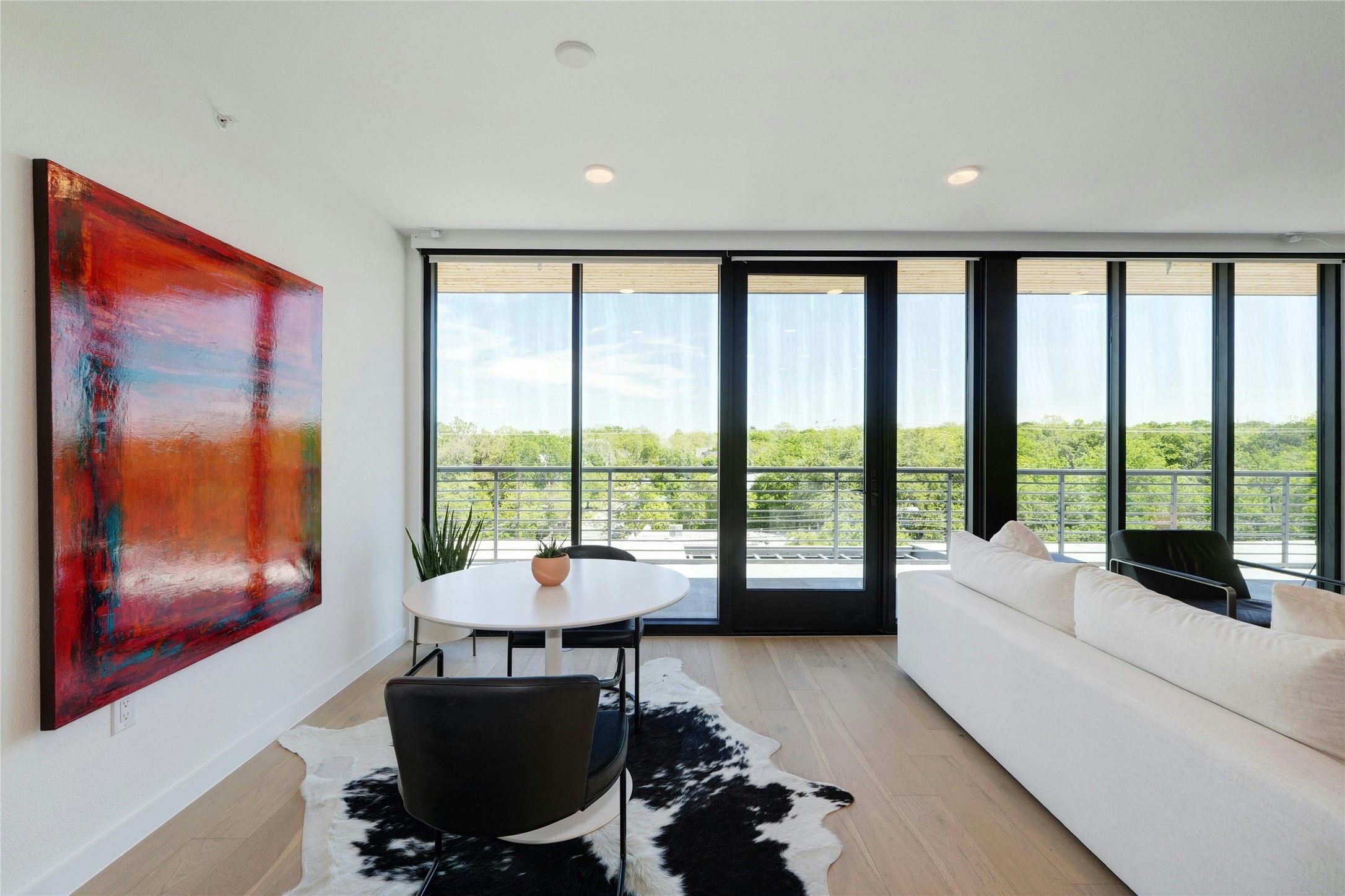 1600 South 1st Street, Unit 403 Austin, TX 78704 - Photo 6 of 33 a living room with furniture and large windows