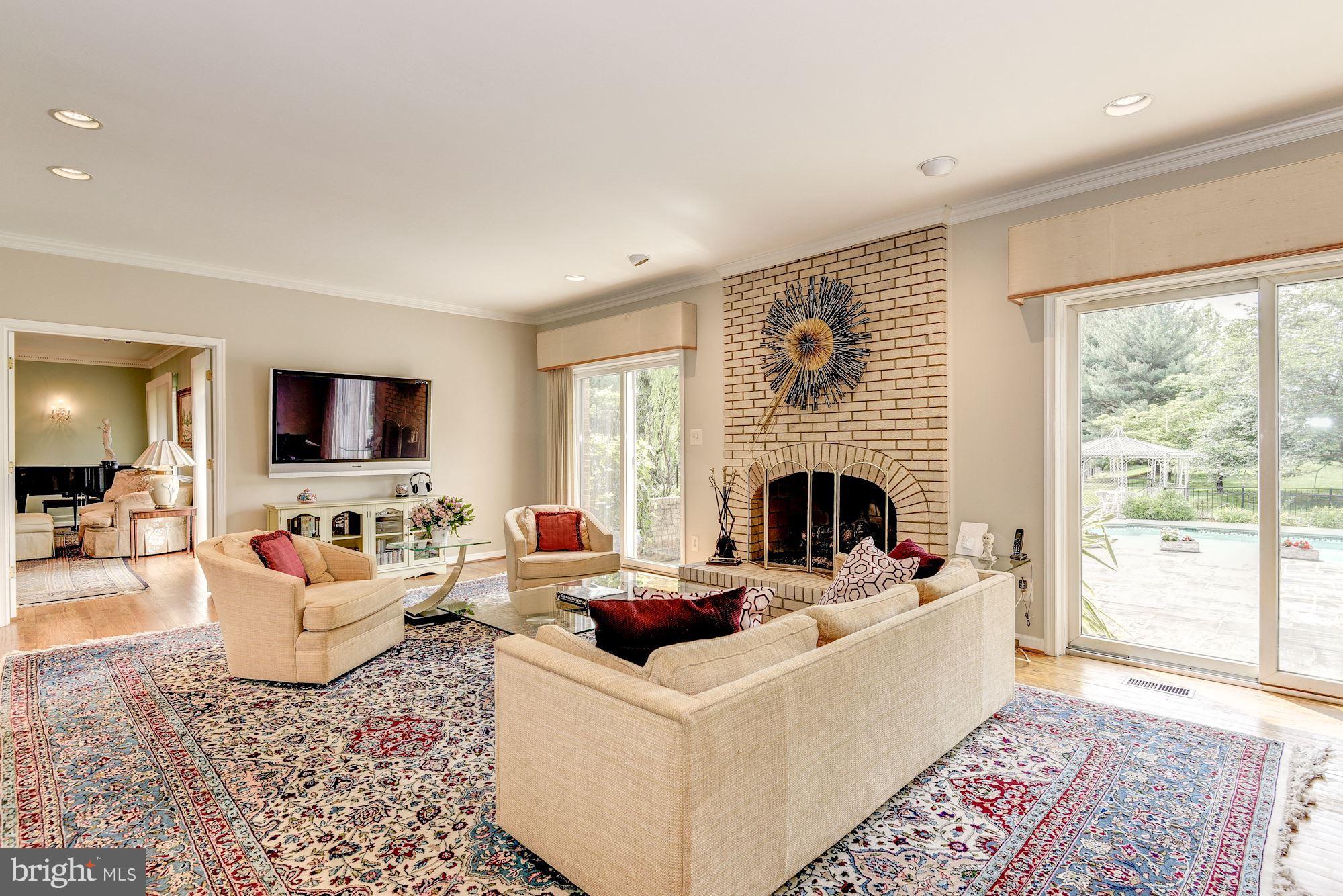 10918 Brent Road Potomac, MD 20854 - Photo 6 of 29 Family Room with wood burning fireplace