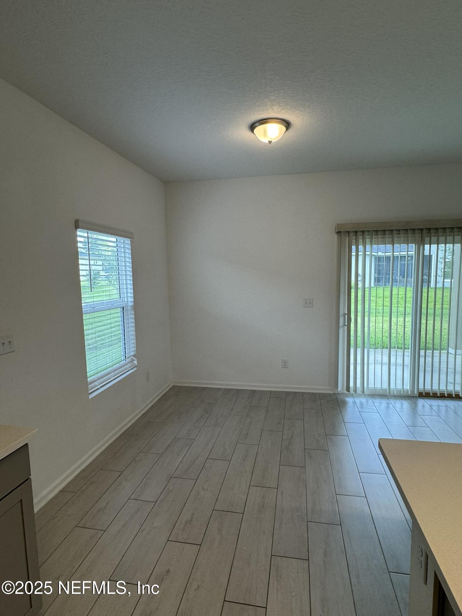 3145 Flower Branch Avenue Orange Park, FL 32073 - Photo 20 of 52 a view of an empty room with a window