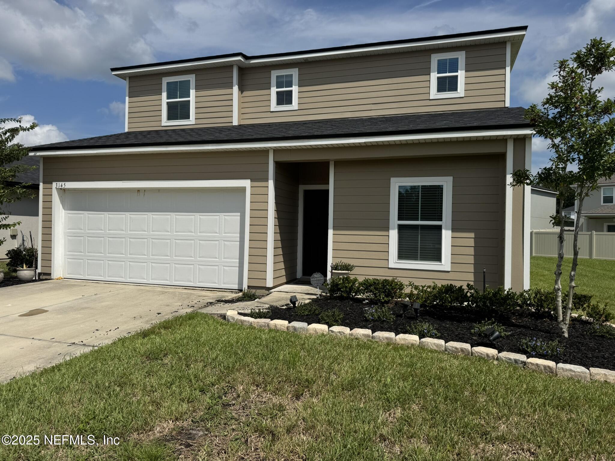 3145 Flower Branch Avenue Orange Park, FL 32073 - Photo 2 of 52 a front view of a house
