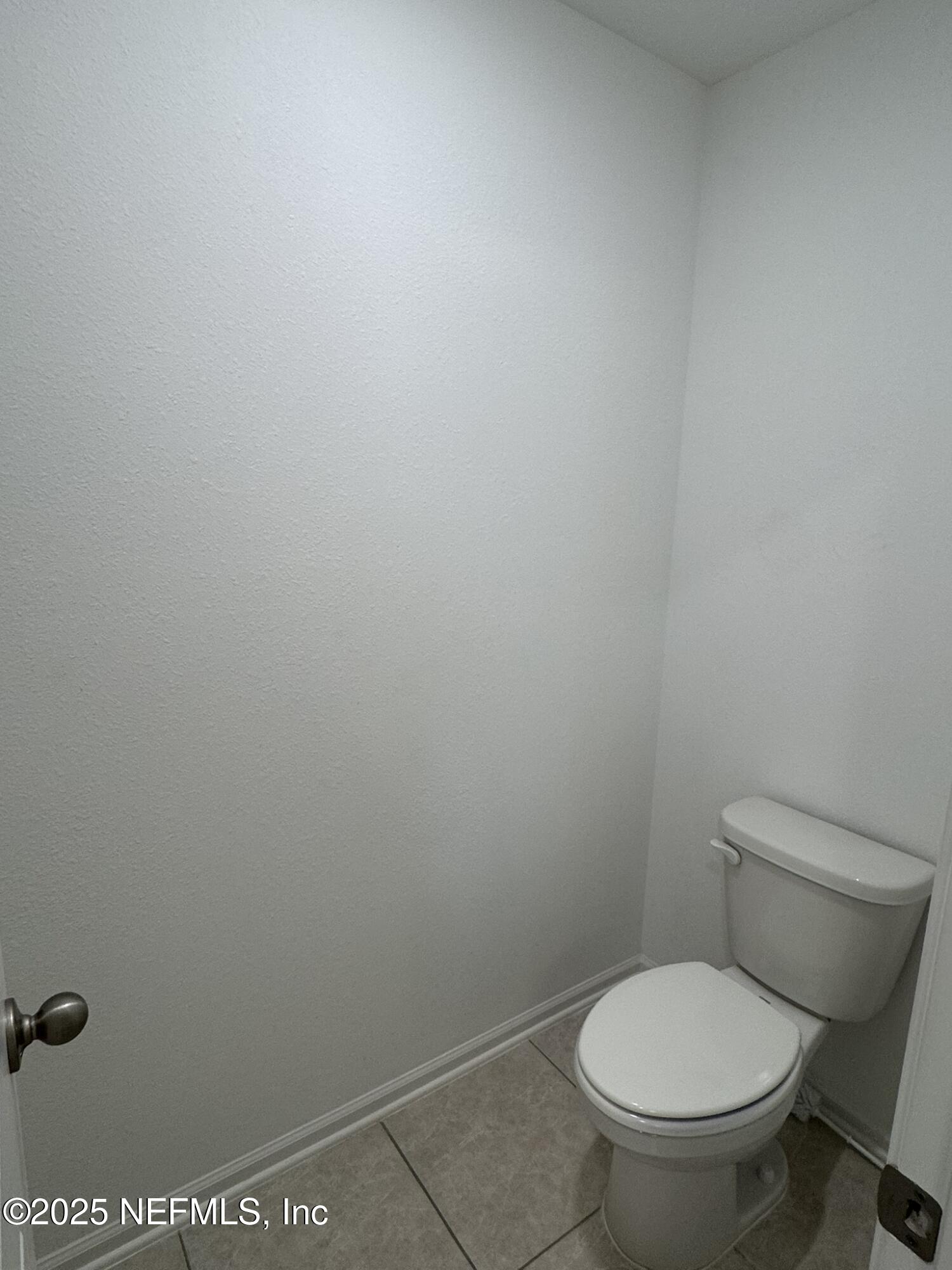 3145 Flower Branch Avenue Orange Park, FL 32073 - Photo 46 of 52 a white toilet sitting next to a white wall
