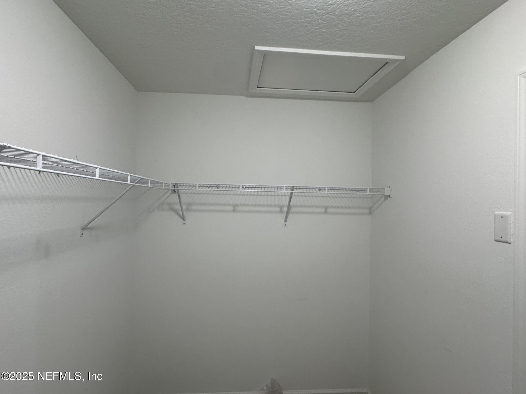 3145 Flower Branch Avenue Orange Park, FL 32073 - Photo 48 of 52 a view of a room with racks on the wall