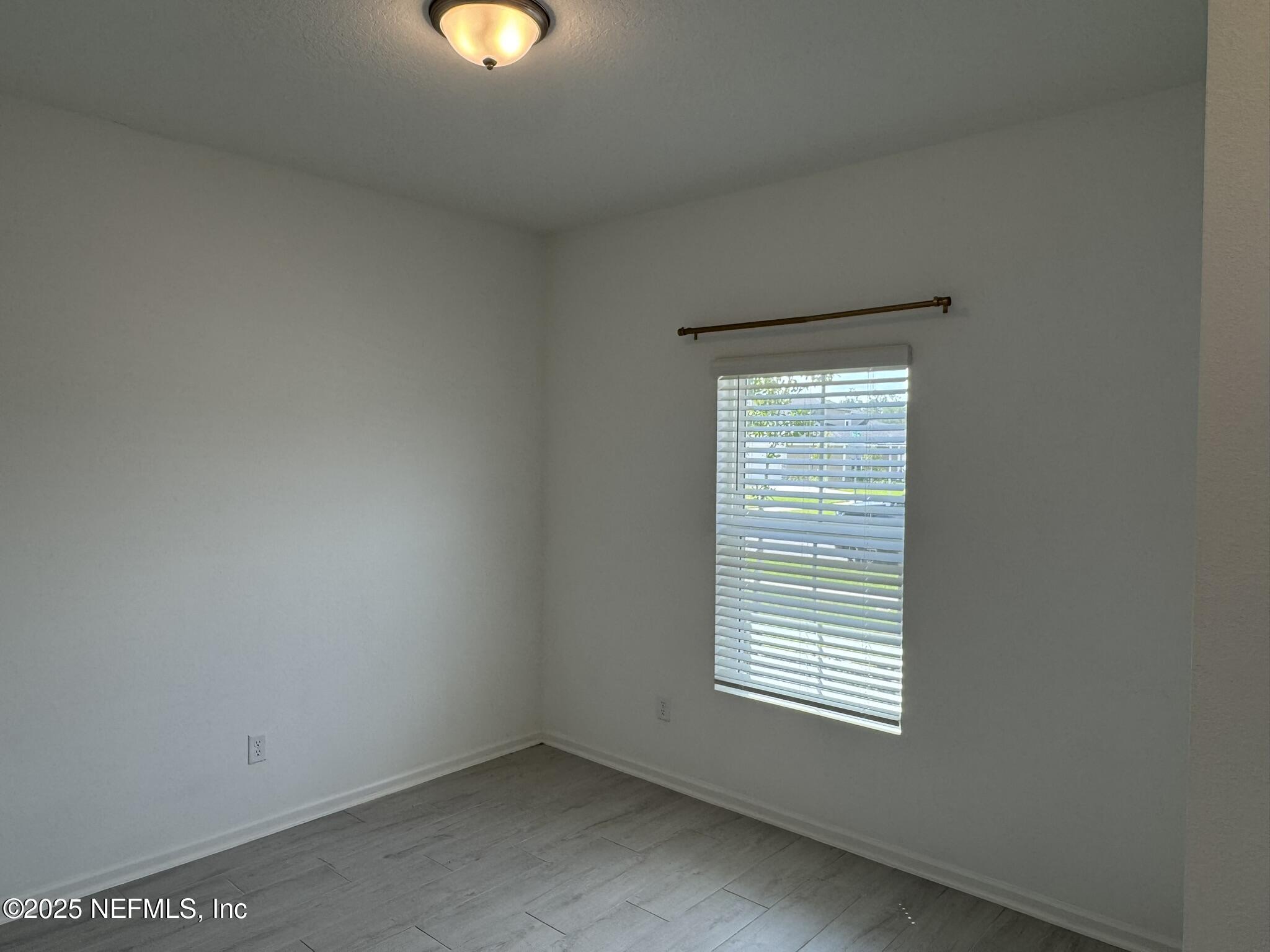 3145 Flower Branch Avenue Orange Park, FL 32073 - Photo 8 of 52 a view of a room that has a window in it