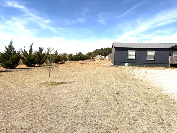 a front view of a house with lake view