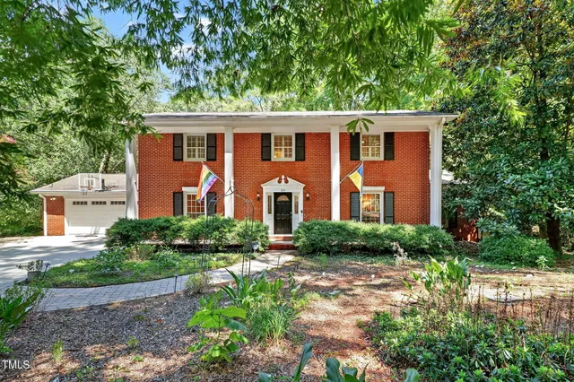 a black and white photo of a living room