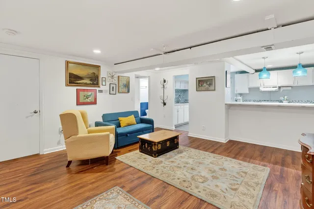 a view of a backyard with wooden fence