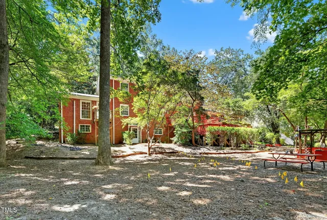 a view of backyard with green space