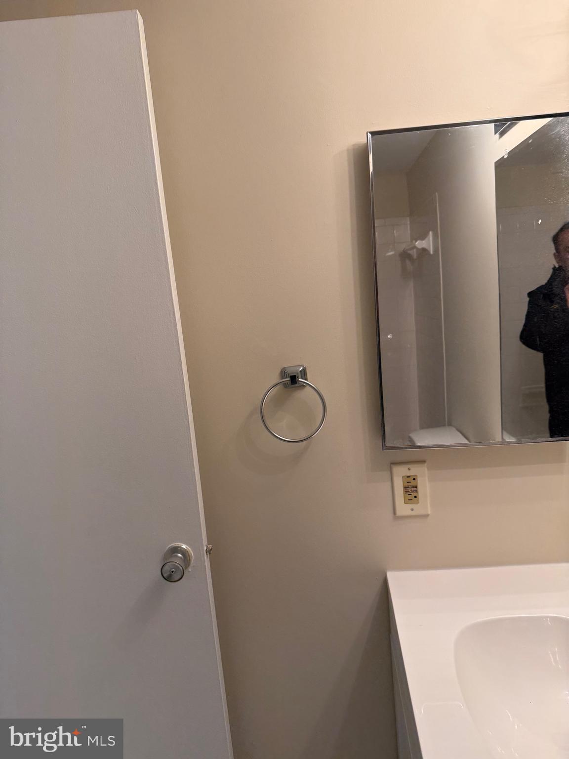 531 Florida Avenue, Unit 104 Herndon, VA 20170 - Photo 34 of 46 a bathroom with a sink and mirror