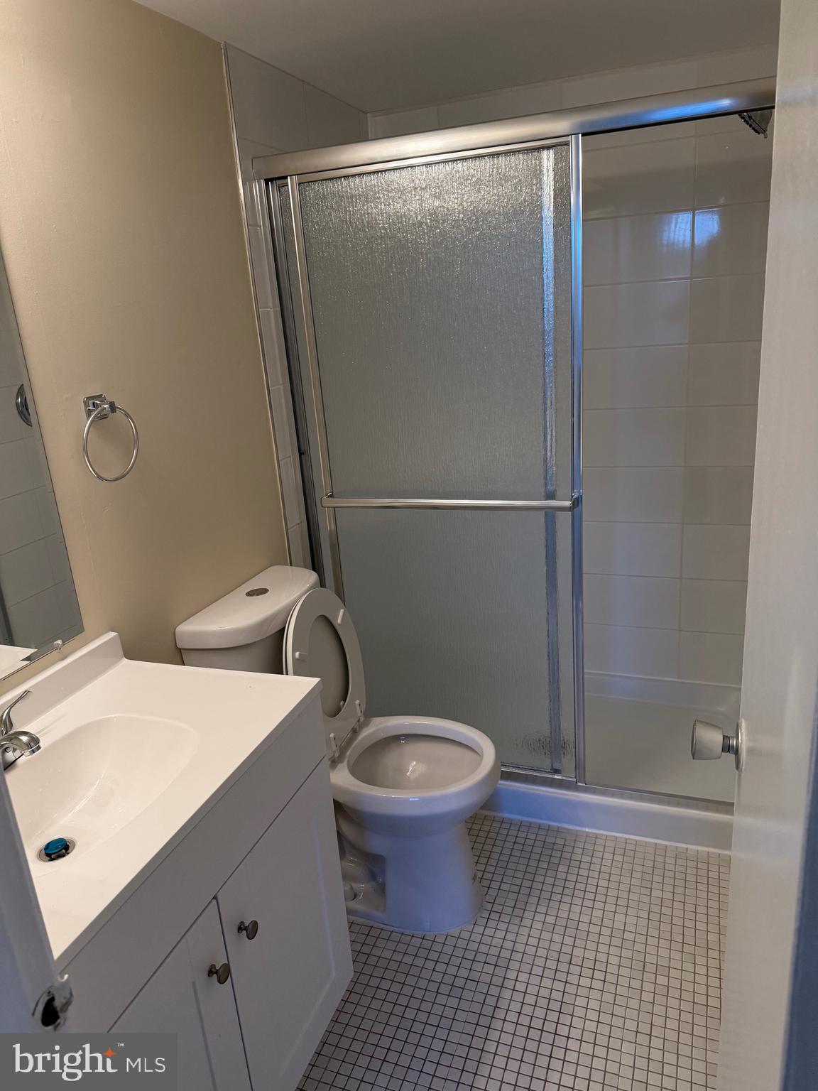 531 Florida Avenue, Unit 104 Herndon, VA 20170 - Photo 39 of 46 a bathroom with a sink toilet and shower