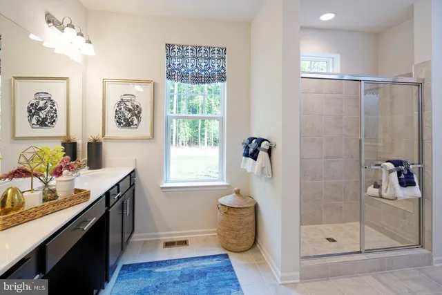 a kitchen with a sink and a refrigerator