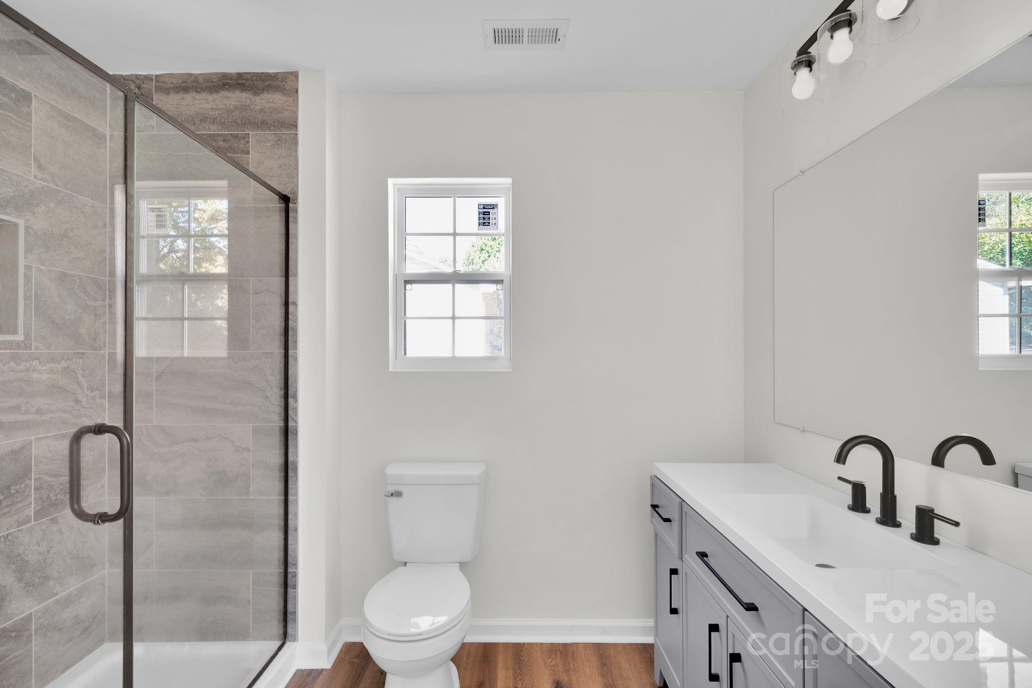 808 3rd Street Kings Mountain, NC 28086 - Photo 18 of 30 a bathroom with a sink toilet and shower