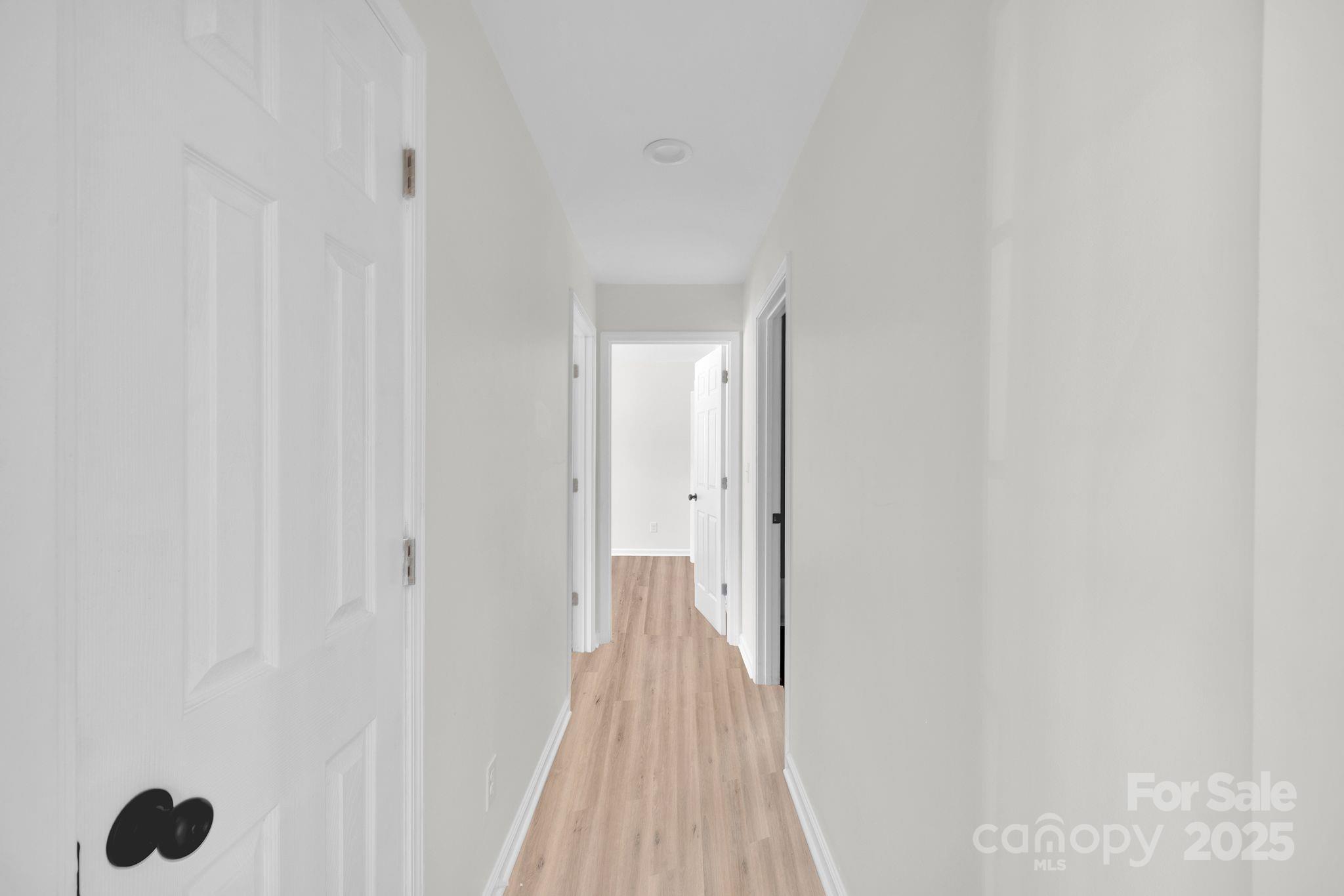 808 3rd Street Kings Mountain, NC 28086 - Photo 20 of 30 a view of a hallway with wooden floor