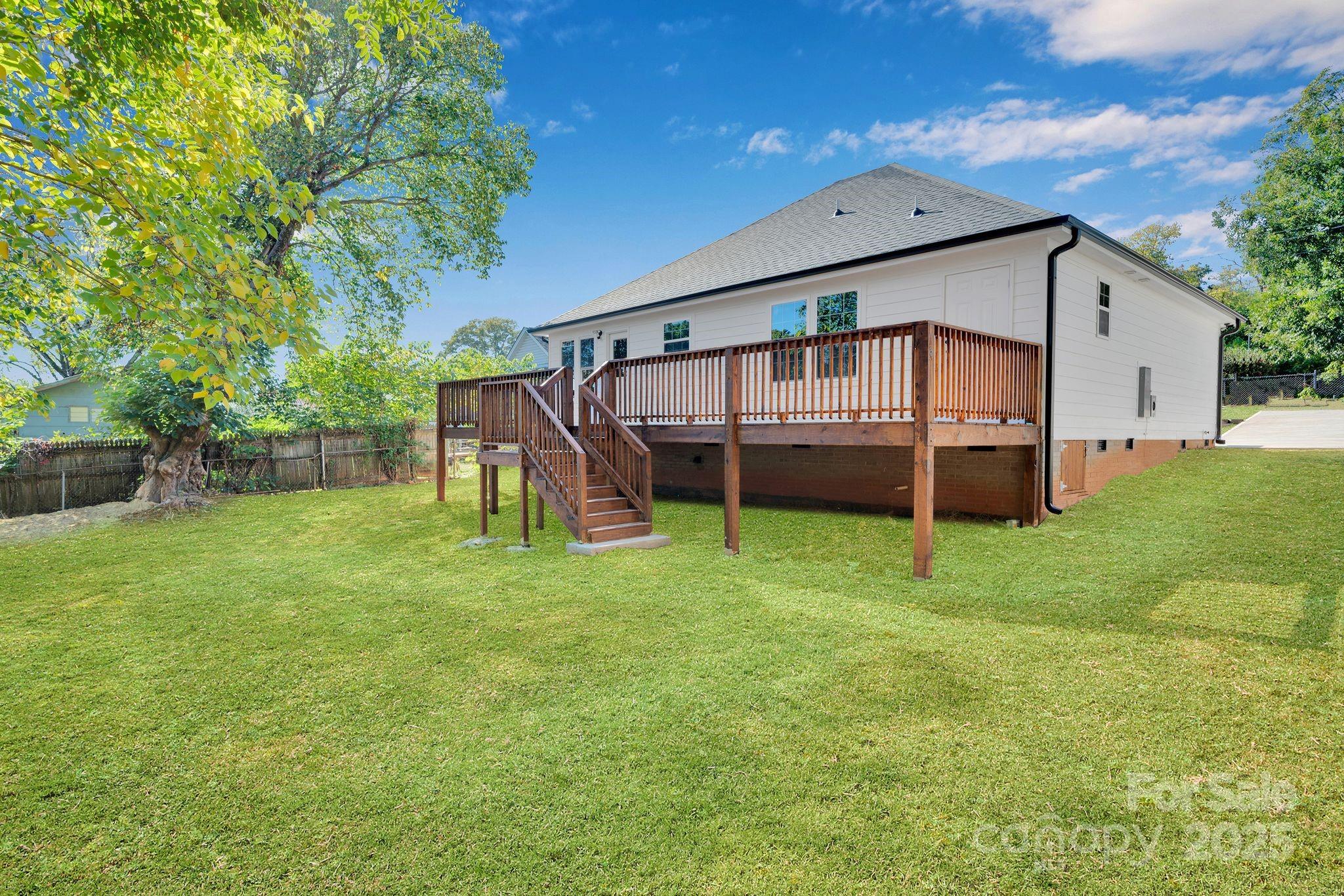 808 3rd Street Kings Mountain, NC 28086 - Photo 4 of 30 a view of a house with a backyard