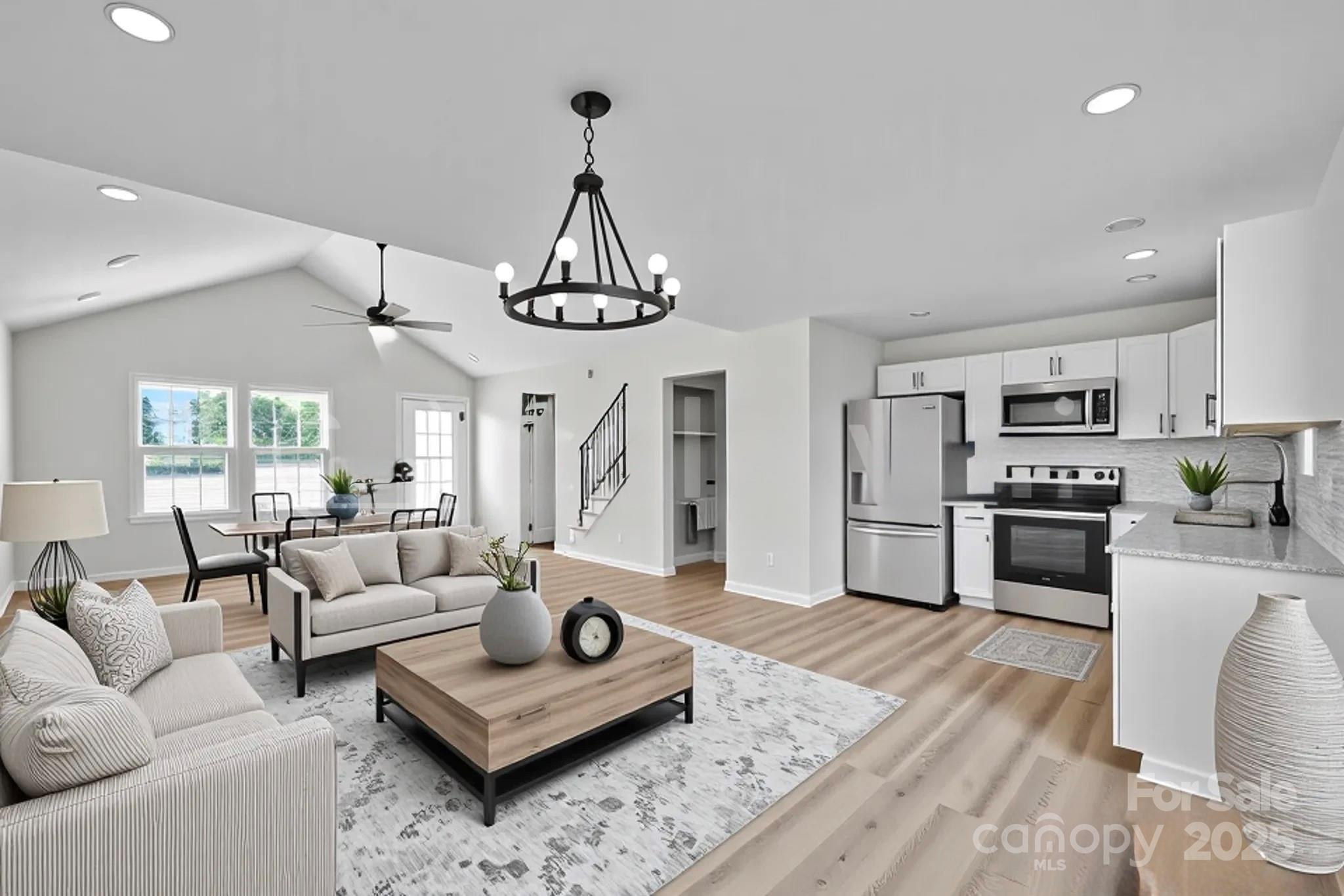 808 3rd Street Kings Mountain, NC 28086 - Photo 6 of 30 a living room with furniture and kitchen view