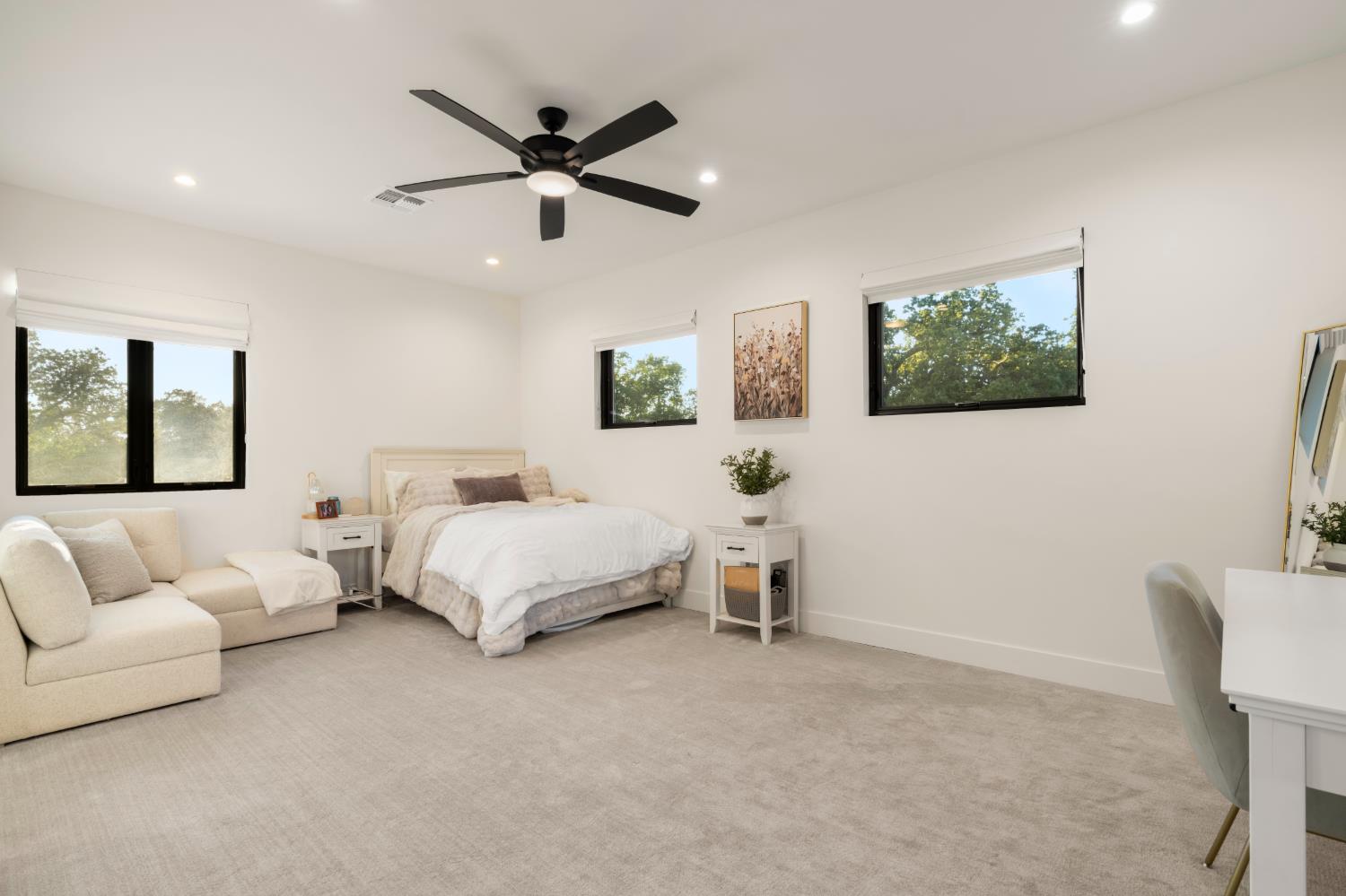 7697 Horseshoe Bar Road Loomis, CA 95650 - Photo 49 of 76 a bedroom with a bed and a couch