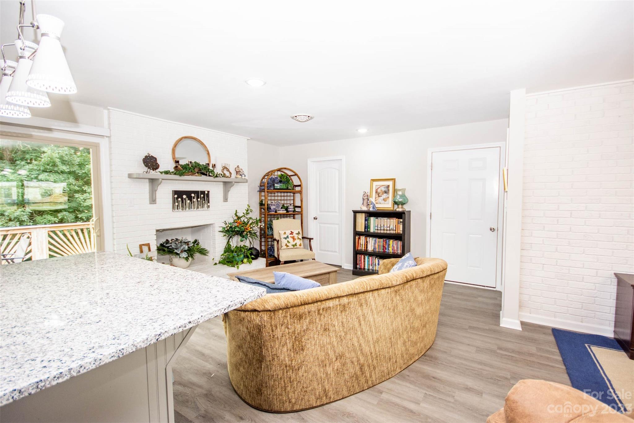 357 Pop Davis Road Taylorsville, NC 28681 - Photo 15 of 45 a living room with furniture and wooden floor