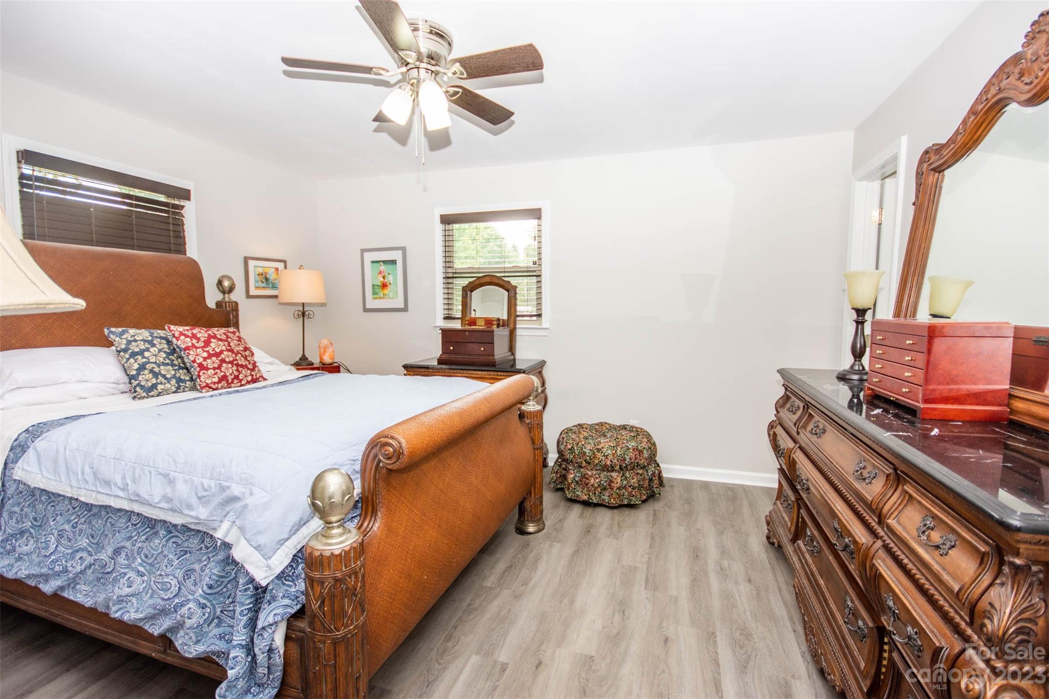 357 Pop Davis Road Taylorsville, NC 28681 - Photo 25 of 45 a bedroom with a bed and wooden floor