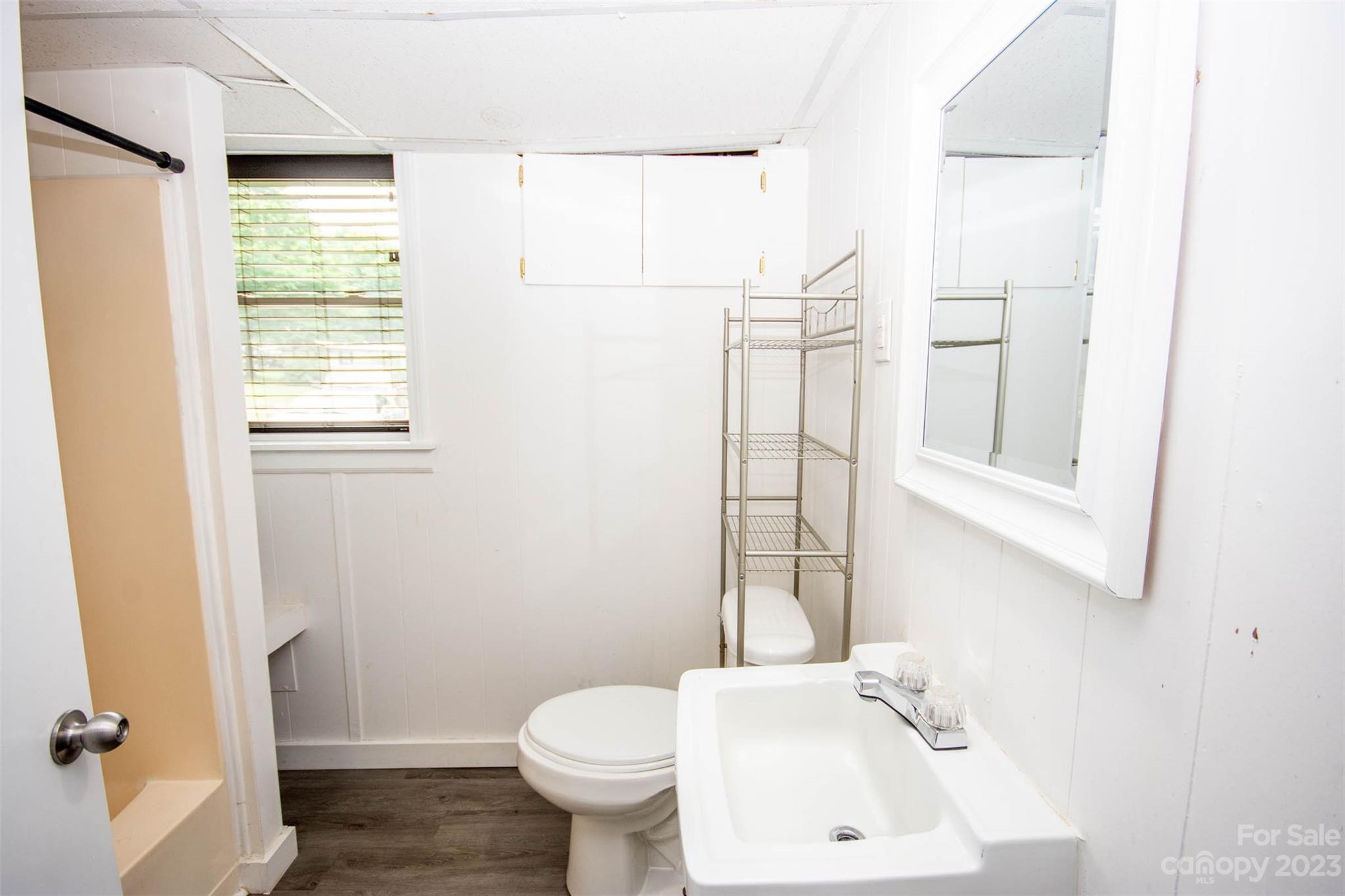 357 Pop Davis Road Taylorsville, NC 28681 - Photo 34 of 45 a bathroom with a sink toilet and shower