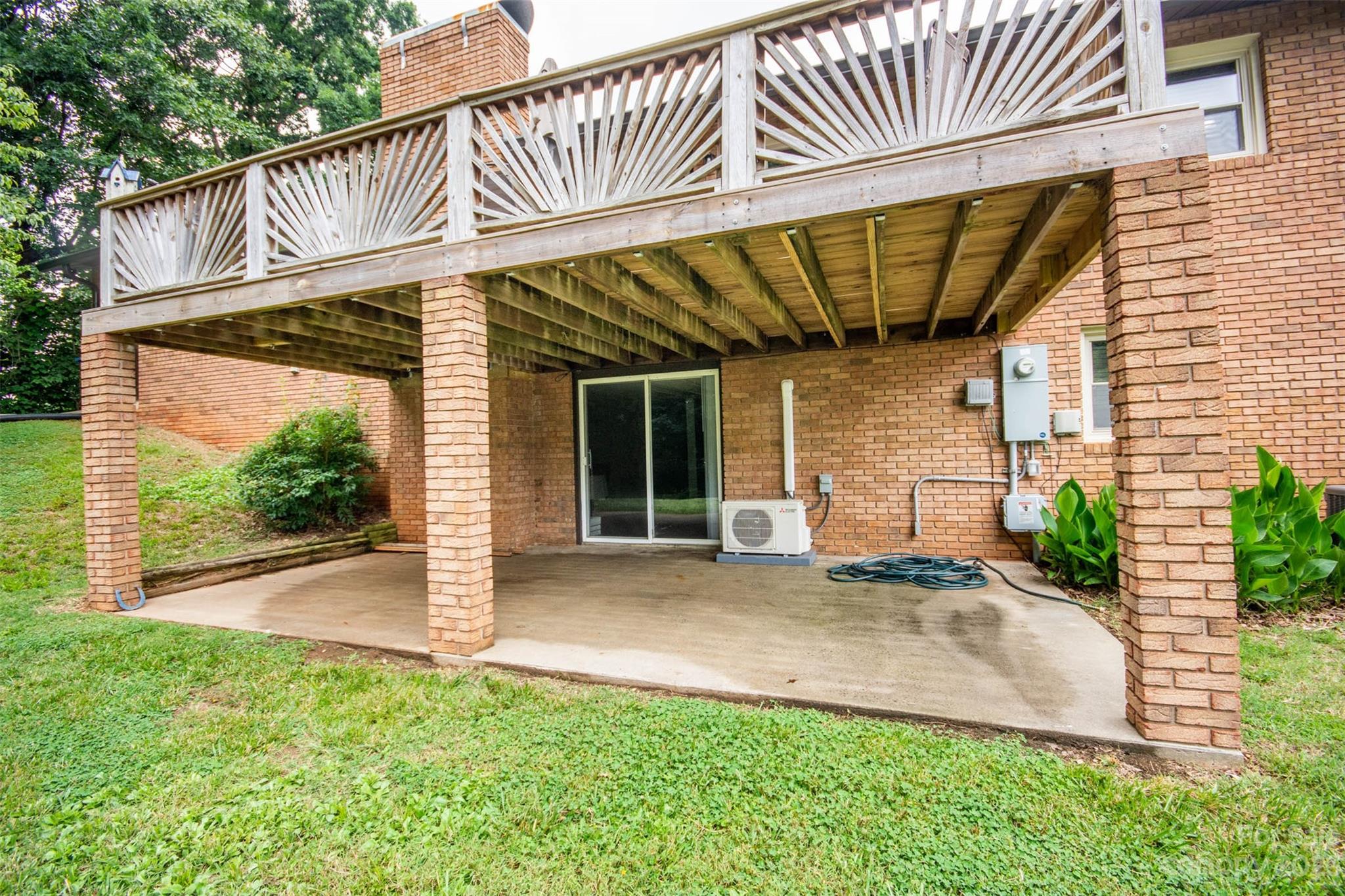 357 Pop Davis Road Taylorsville, NC 28681 - Photo 35 of 45 a front view of a house with garden