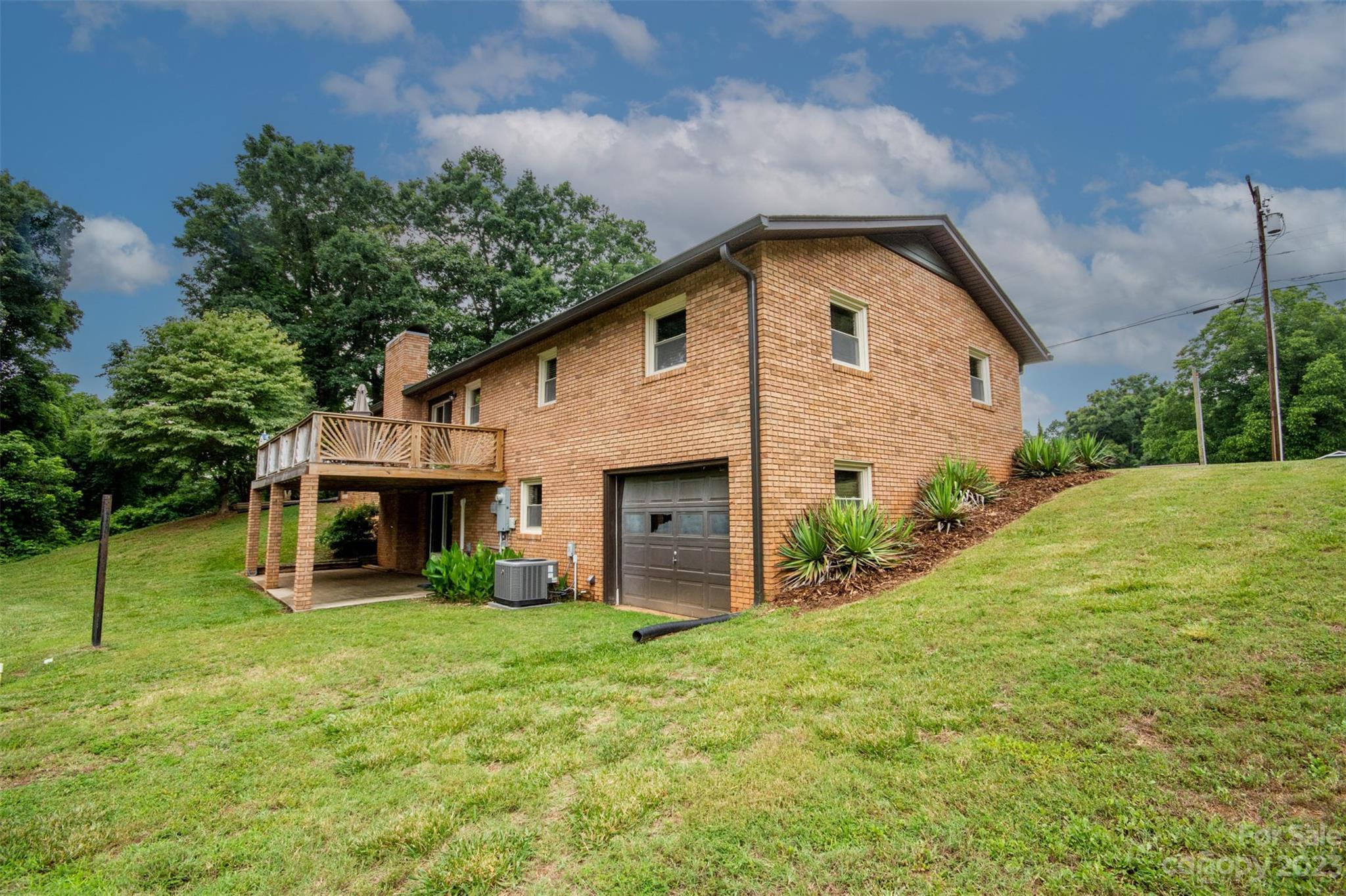 357 Pop Davis Road Taylorsville, NC 28681 - Photo 41 of 45 a front view of house with yard and green space