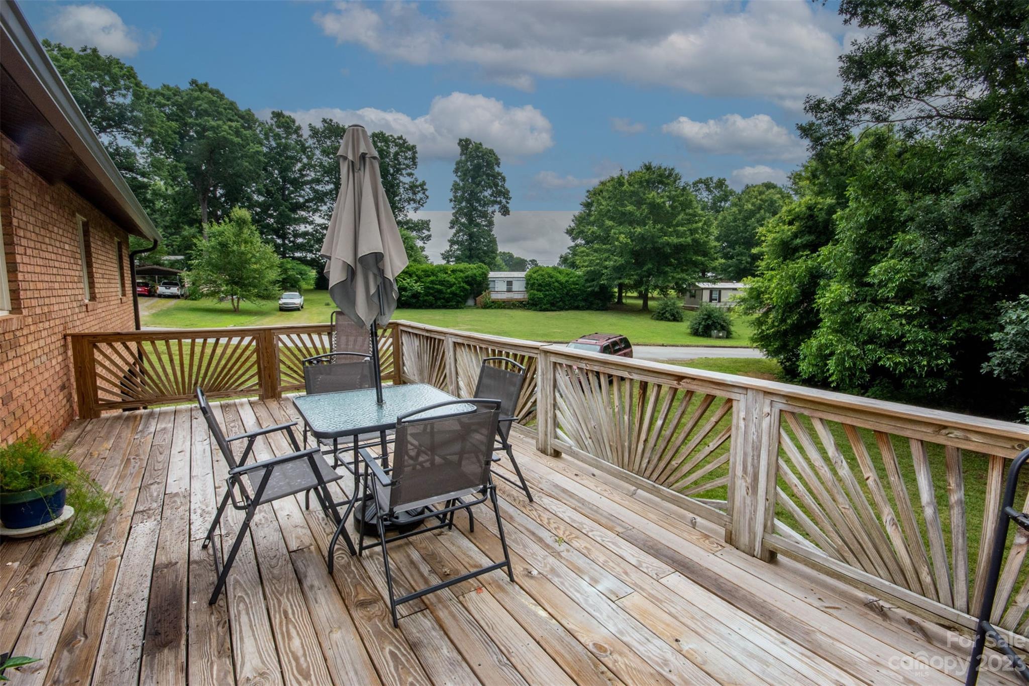 357 Pop Davis Road Taylorsville, NC 28681 - Photo 45 of 45 a view of balcony with furniture and trees