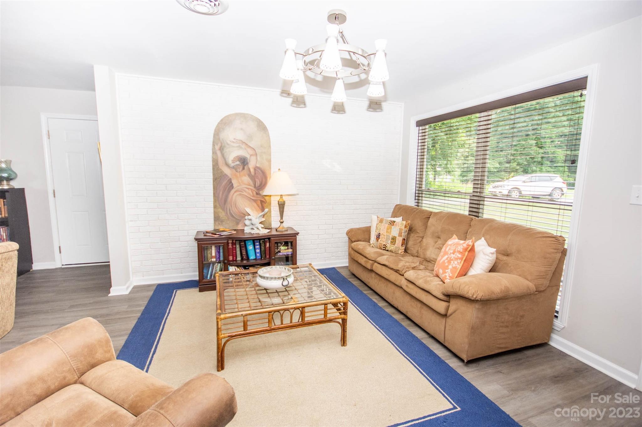 357 Pop Davis Road Taylorsville, NC 28681 - Photo 7 of 45 a living room with furniture and a large window