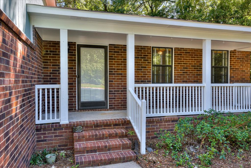 4162 Arlington Road Evans, GA 30809 - Photo 3 of 33 ROCKING CHAIR PORCH