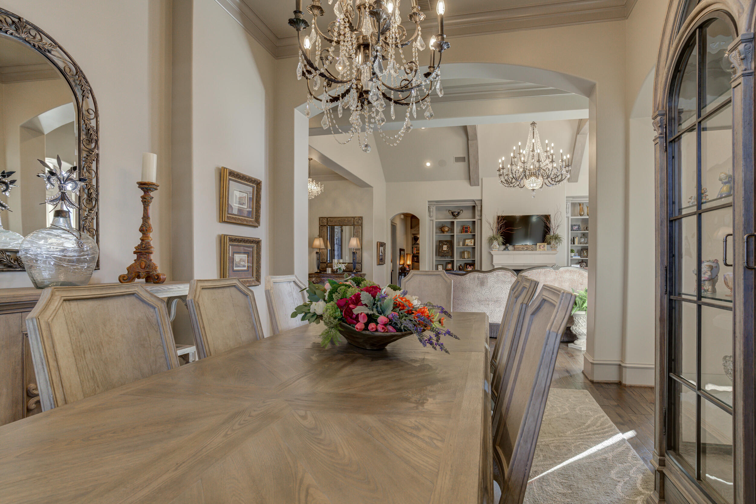 4815 119th Street Lubbock, TX 79424 - Photo 15 of 74 a living room with furniture and a chandelier