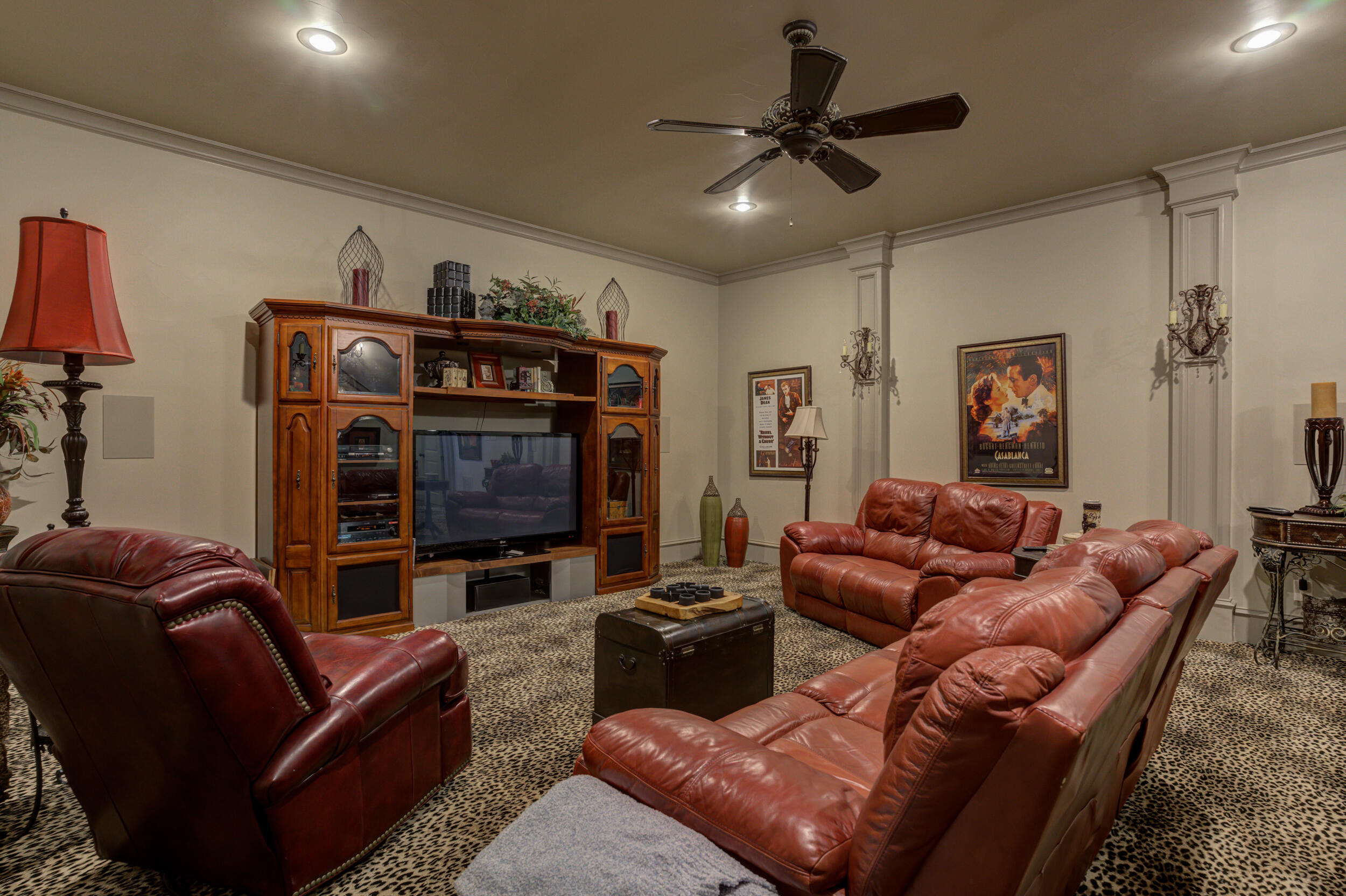 4815 119th Street Lubbock, TX 79424 - Photo 47 of 74 a living room with furniture and a flat screen tv