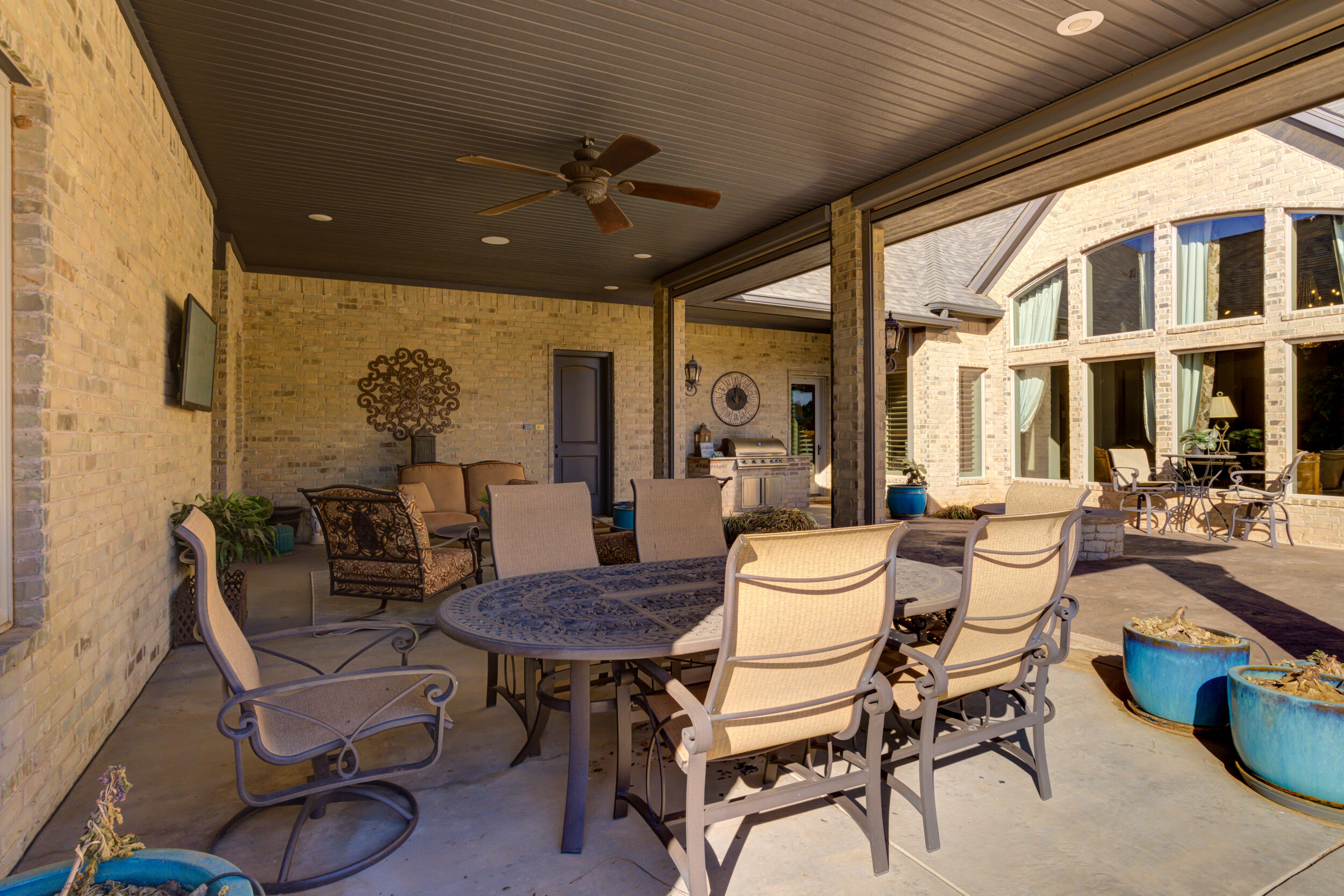 4815 119th Street Lubbock, TX 79424 - Photo 72 of 74 a view of a patio with table and chairs