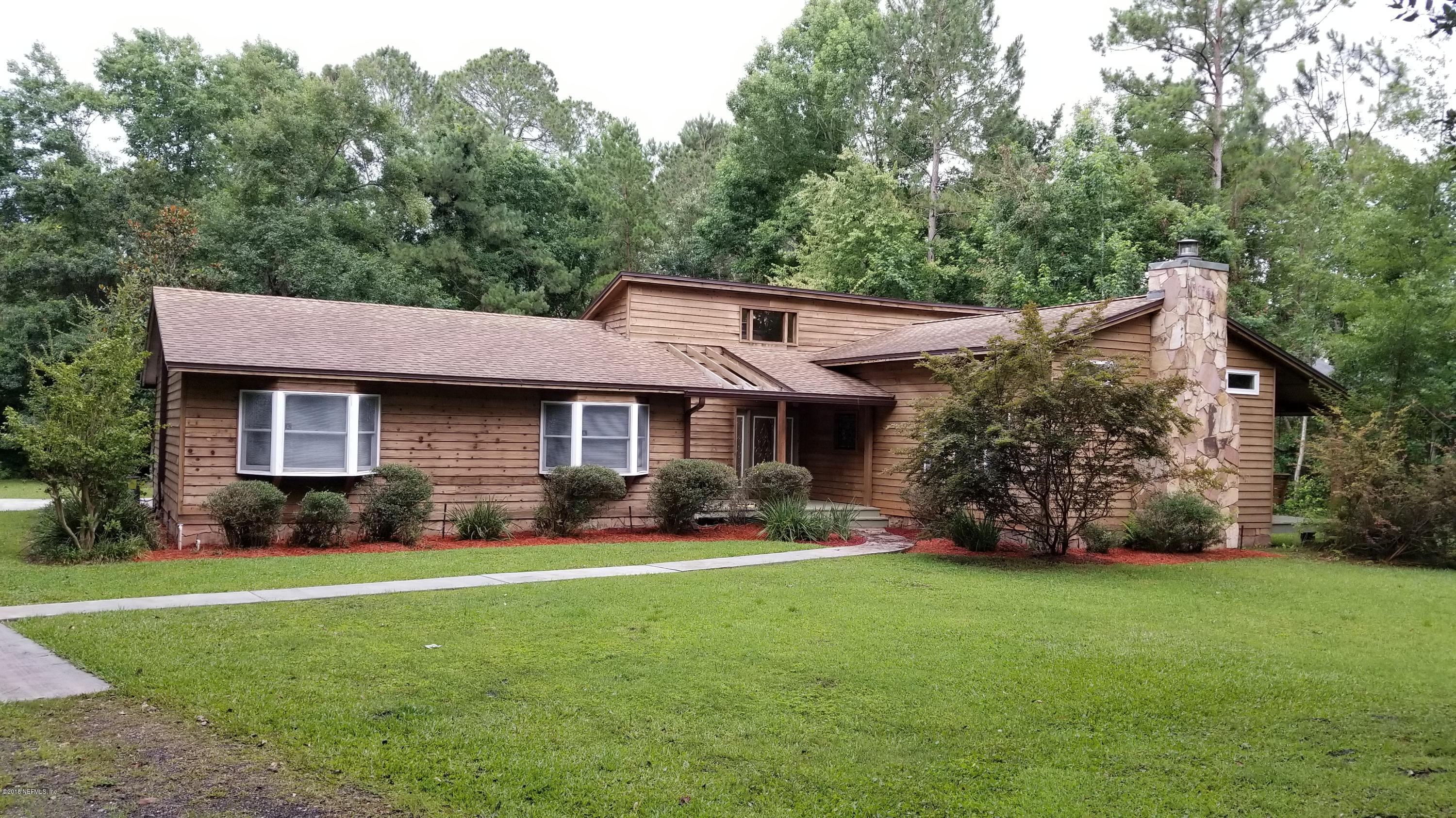 4935 Raggedy Point Road Fleming Island, FL 32003 - Photo 1 of 43 Custom built cedar home