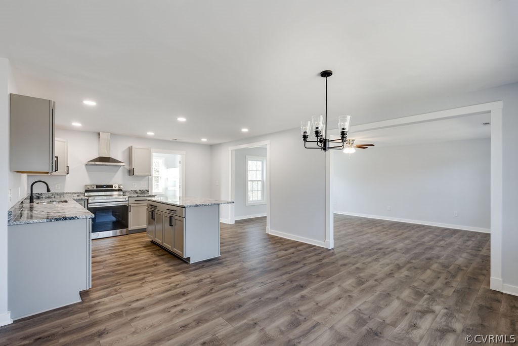 3301 West Hundred Road Chester, VA 23831 - Photo 4 of 15 a kitchen with kitchen island a counter top space appliances and a view of living room
